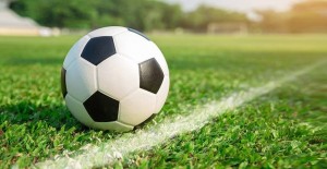 Create meme: football, soccer ball on the grass, soccer ball on field