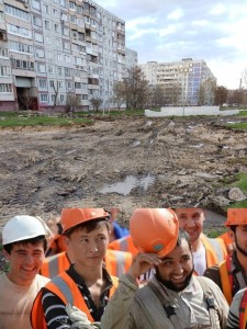 Create meme: migrant workers at a construction site, migrants in construction, migrant workers