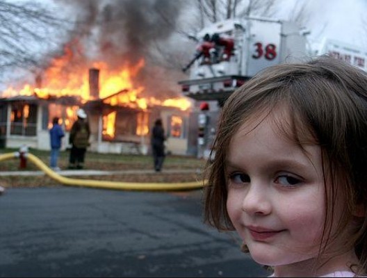 Create meme: a girl on the background of a fire, the girl with the burning house, meme girl and the burning house
