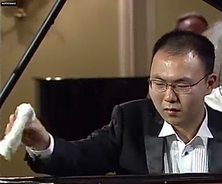 Create meme: An Tianxiu is a pianist, Chinese pianist at the Tchaikovsky competition, enhe the conductor
