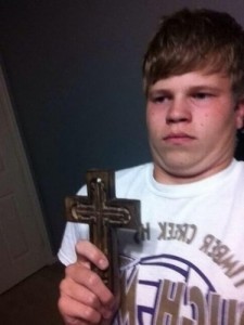 Create meme: meme the kid with a cross, the guy with the cross, Begone