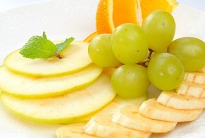 Create meme: yellow grapes pictures, grapes and oranges on a white background, fruit plate