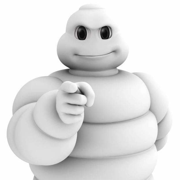 Create meme: bibendum michelin, michelin tires, Michelin tires advertising