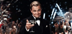 Create meme: Leonardo DiCaprio raises a glass, DiCaprio with a glass of, the great Gatsby Leonardo DiCaprio with a glass of
