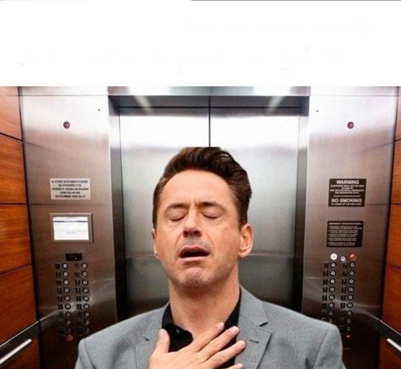 Create meme: a frame from the movie, Robert Downey Jr. meme , finnish kone elevators