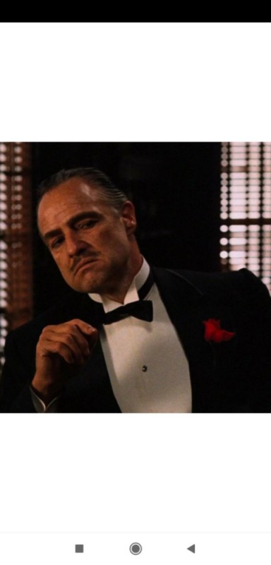 Create meme: the godfather don Corleone , don Corleone Smoking a cigar, don Corleone meme 