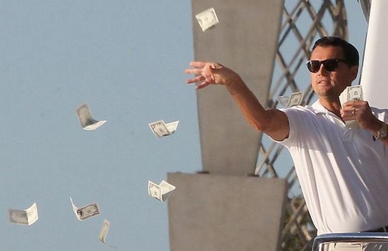 Create meme: the wolf of wall street throwing money, DiCaprio throws money, DiCaprio throws money