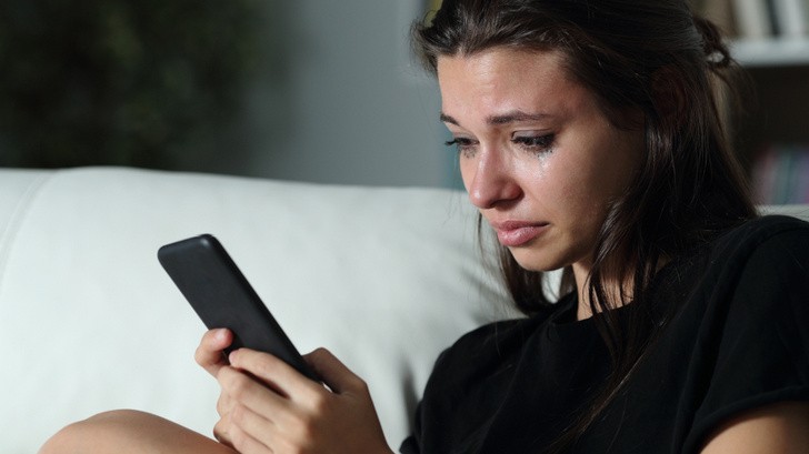 Create meme: a girl with a smartphone, sad girl, crying girl
