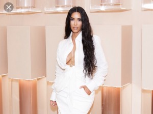 Create meme: white outfit, pop-up shop Kim kardashian, revealing outfits Kim kardashian riveted the eyes of the audience at the summit fashion