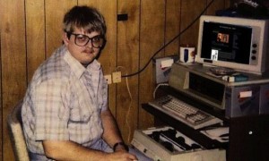 Create meme: programmer nerd, a nerd behind a computer, computer nerd