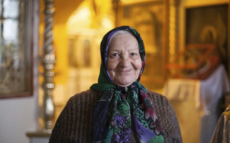 Create meme: grandma , in the temple , an elderly woman in a headscarf