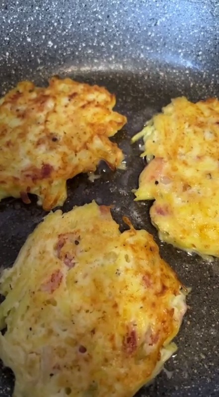 Create meme: potato pancakes, potato pancakes with cheese in a frying pan, draniki with cheese