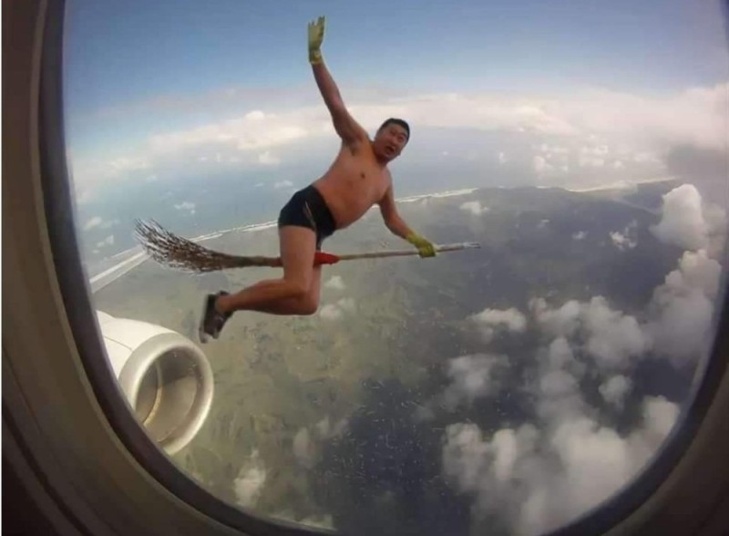 Create meme: a man on the wing of an airplane, the plane is funny, moment 