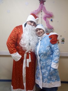Create meme: a costume of father frost and snow maiden, Santa Claus and snow maiden on the house, people