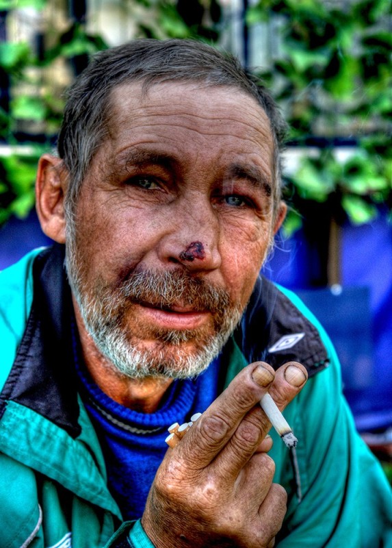 Create meme: arseniy bum, a homeless man with a cigarette, framed!