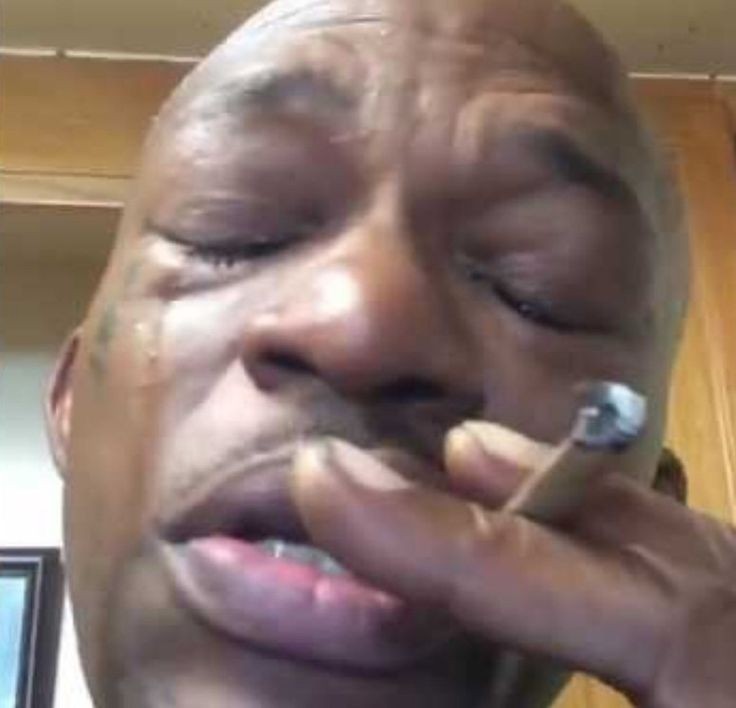 Create meme: crying black man , crying black man meme, a negro with a cigar