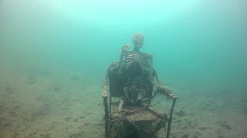 Create meme: the skeleton at the bottom, skeleton on a chair under water, terrible finds under water