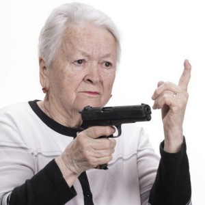 Создать мем: бабушка с пистолетом, телефон с камерой, бабка с револьвером