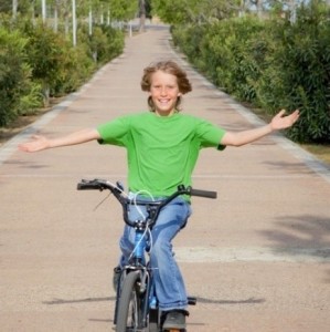 Создать мем: езда на велосипеде, едет на велосипеде, мальчик на велосипеде