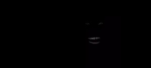 Создать мем: чёрное лицо, черный в темноте, негр смеется в темноте
