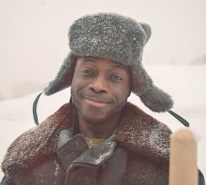 Create meme: Negro, ushanka, the man in the cap