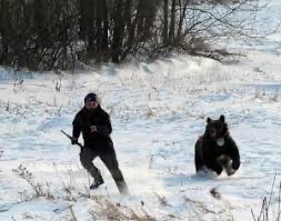 Create meme: bear hunting, a man runs away from a bear, runs away from the bear 