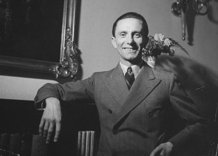 Create meme: Joseph Goebbels , Paul Joseph Goebbels with flowers, Joseph Goebbels as a young man