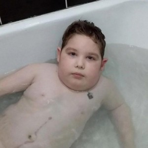 Create meme: toddler boy, bath, people