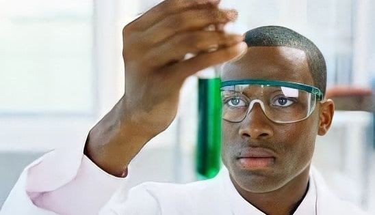 Create meme: the negro scientist, a negro with a test tube, scientist meme