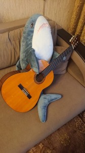 Create meme: shark Blaha, guitar