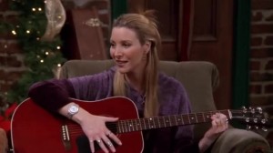Create meme: Phoebe friends, Phoebe Buffay with guitar, friends Phoebe with a guitar