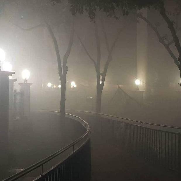 Create meme: foggy morning in the city, foggy city, running in the fog