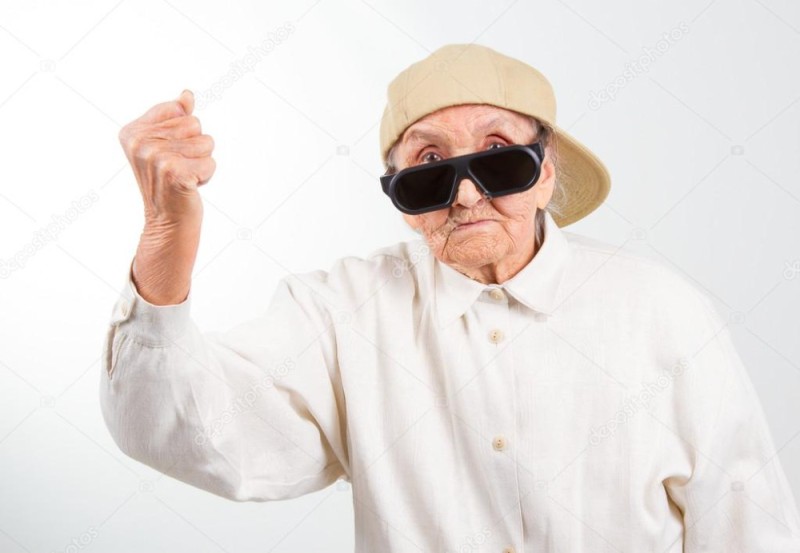 Create meme: granny in VR glasses, granny with a fist, old lady stock