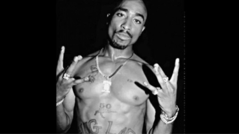 Create meme: tupac west side, 2pac 2021, Tupac's tattoo thug life