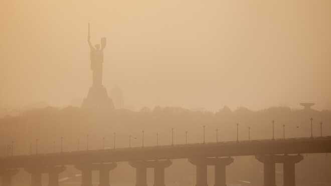 Create meme: New York in smoke, foggy Kiev, blurred image