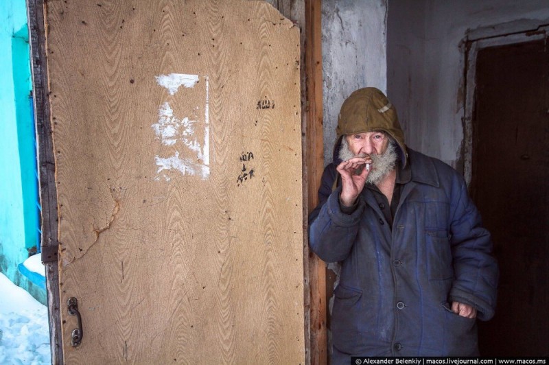 Create meme: a homeless man in an abandoned house, homeless Vladimir, house the homeless