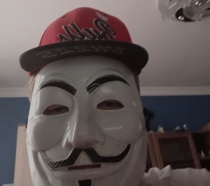 Создать мем: маска анонимуса, человек