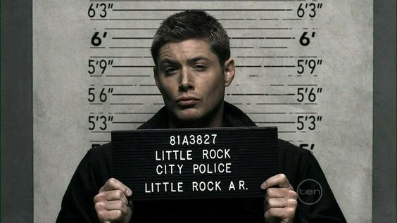 Create meme: criminal with a sign, Dean Winchester Mugshot, dean winchester 