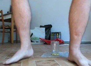 Create meme: a man sits on a jar, man's legs, legs legs