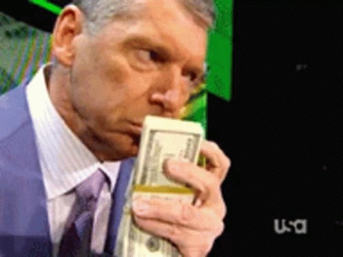 Create meme: Vince McMahon, Vince McMahon money, Vince McMahon's smelling the money