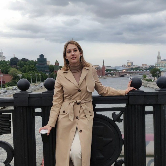 Create meme: Moscow , women's trench coat, people 