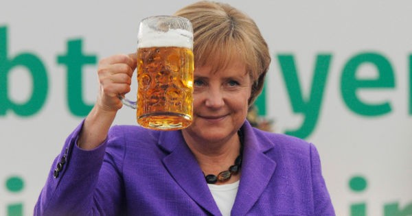 Create meme: Angela Merkel with beer, Angela Merkel , Merkel with a beer mug