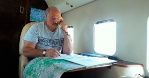 Create meme: Lukashenko phone helicopter joke, Male, meme with Lukashenko in the helicopter