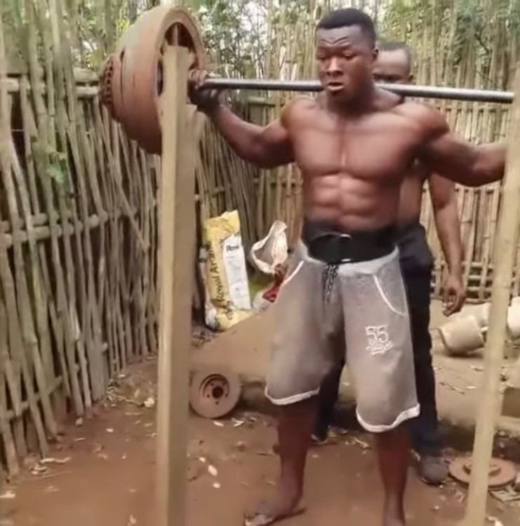 Create meme: pitching in Africa, blacks pull a barbell in Africa, Samuel Kulbila training