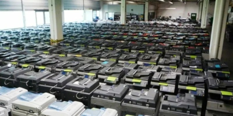 Create meme: lots of printers, lithium storage battery, electronics 