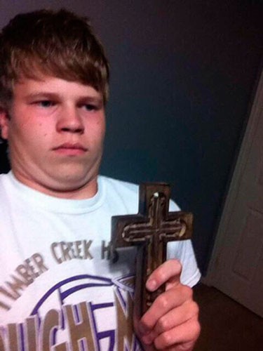 Create meme: the cross meme, meme the kid with a cross , the guy with the cross