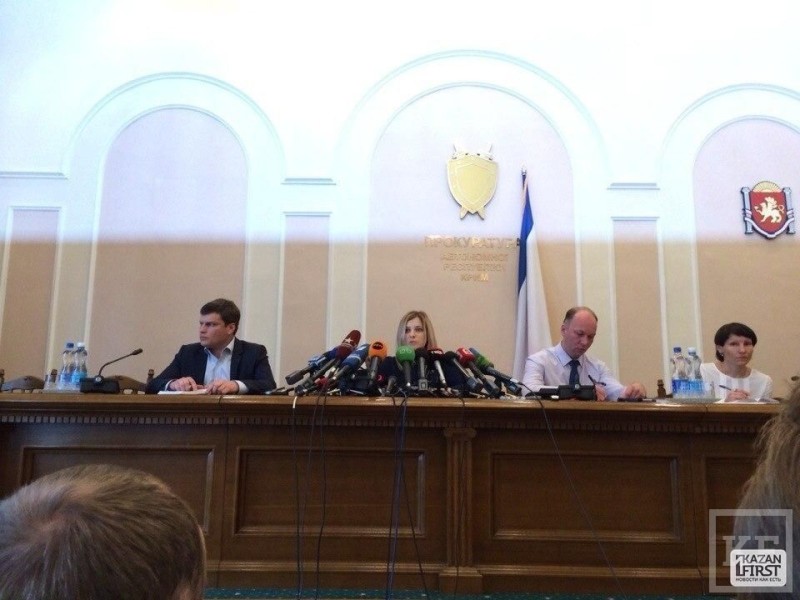 Create meme: Poklonskaya has a lot of microphones, prosecutor general, Natalia Vladimirovna Poklonskaya