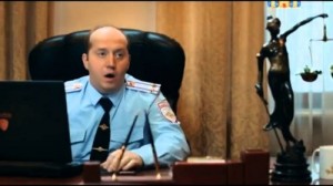 Create meme: Yakovlev COP with rublevki, Yakovlev police officer with the ruble photo, Volodya policeman with rublevki