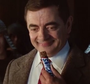 Create meme: advertising Snickers with a black man, advertising Snickers, Mr bean advertising Snickers