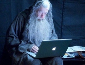 Создать мем: gandalf, гэндальф за компьютером, гэндальф с ноутбуком